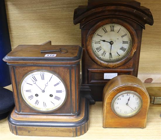 Three mantel clocks